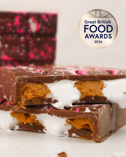S’mores stuffed chocolate bars showing marshmallow fluff and Biscoff filling with Great British Food Awards 2026 Bronze badge